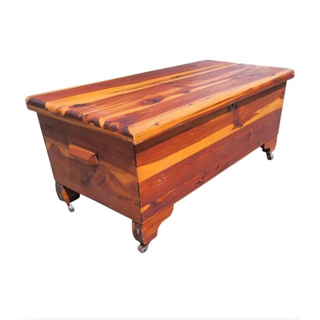 A 1960s vintage blanket chest in solid pine and steel wheels. Solid wood handles on both sides. Comes with working lock...