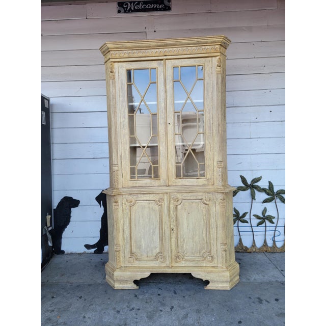 1980's rustic neoclassical style carved beige wood corner hutch cabinet Bottom has doble wood doors and single wood shelf....