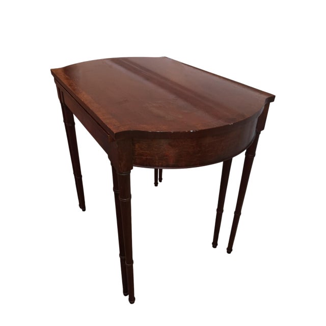 Maximize your living space without sacrificing classic elegance with this versatile Antique Sheraton-Style Mahogany...