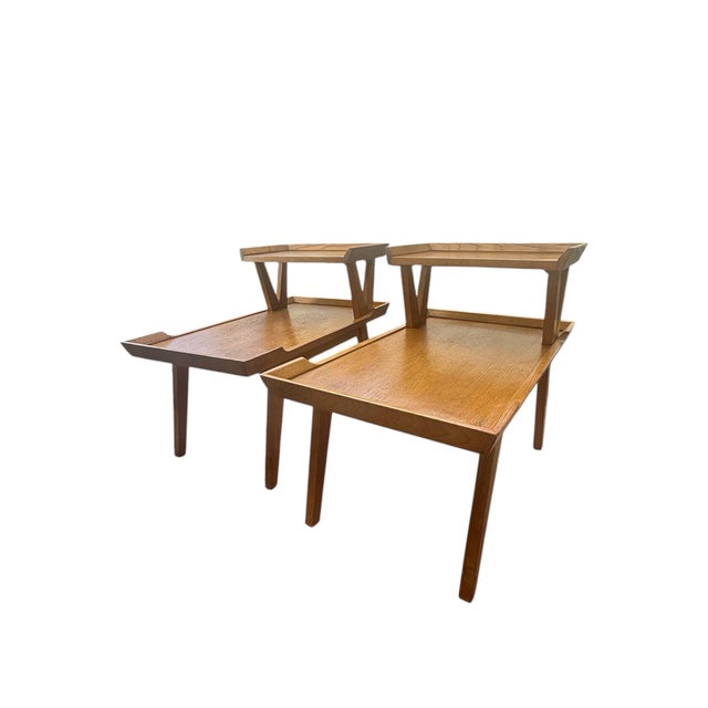 An exceptional and rarely encountered pair of early Lane Alta Vista two-tier end tables, Style No. 47, manufactured in...