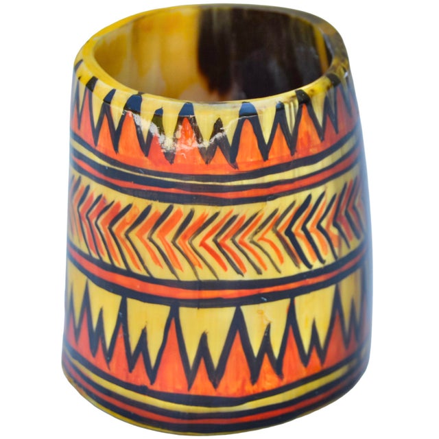 Eye-catching vintage West-African catchall, meticulously handmade in an ornate silhouette with natural horn hues....
