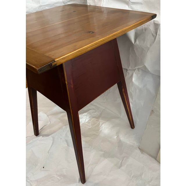 A nice pine planks table / stand from Upstate New York. Tapered legs. Nice honey brown tones.