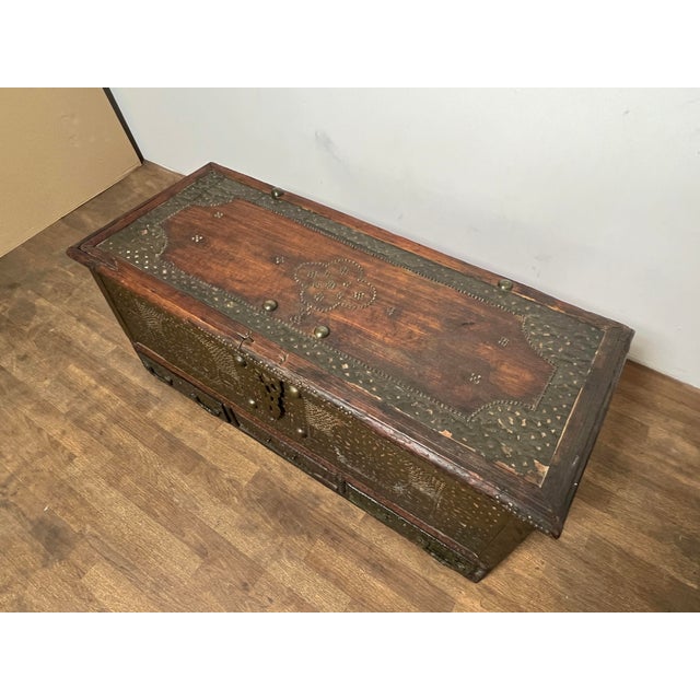 A rare 18th century North African Zanzibar trunk, fashioned of cedar with studded decoration and clad with pierced copper...