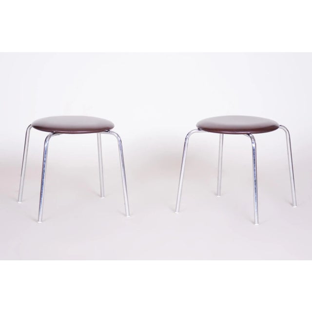 Midcentury stools, Original well preserved condition. Period: 1960-1969 Material: Chrome plated steel and leatherette...
