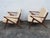This Rare Pair of Lounge Chairs are made out of wood, solid wood, and fabric. These chairs have Danish Modern style and...