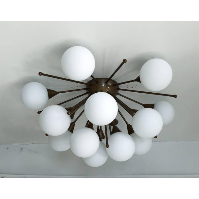 Italian sputnik flush mount with matte white Murano glass mounted on solid brass frame in bronze finish / Made in Italy by...