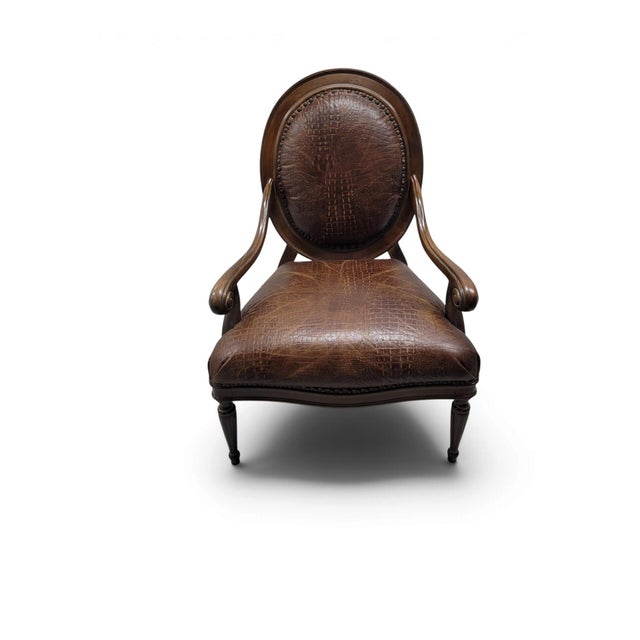 A striking pair of Italian-made French Neoclassical Louis XVI-style open-arm fauteuils, upholstered in richly textured,...