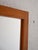 Danish mirror produced in the 1960s with teak wood frame. A minimalist design typical of the Scandinavian style of the...