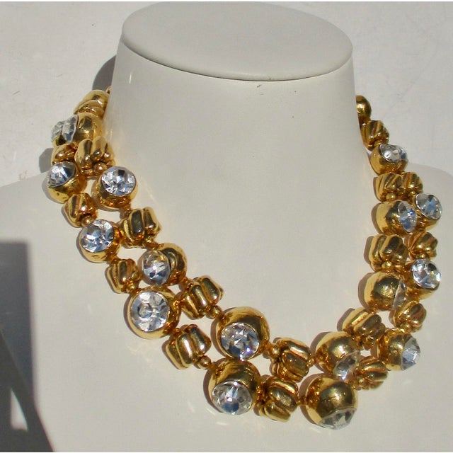 Chanel Crystal long strand of gold-plated crystals. A Cartier stamp is on the back of the hook closure. Crystal beads and...