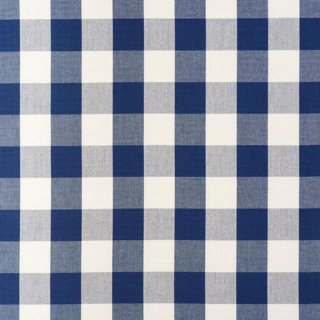 A classic one and a half-inch buffalo check, this woven cotton is a wonderful complement to both prints and plains. Sold...