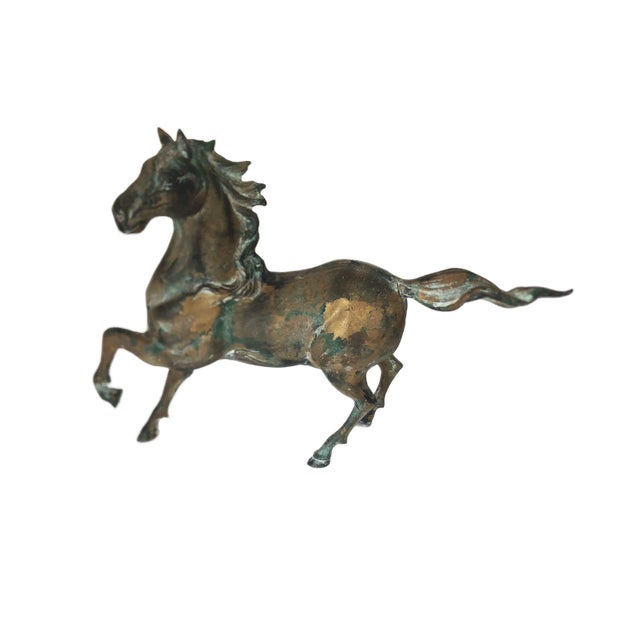 This substantial vintage cast iron horse figurine, crafted in Japan by Toyo during the 1970s, commands attention with its...