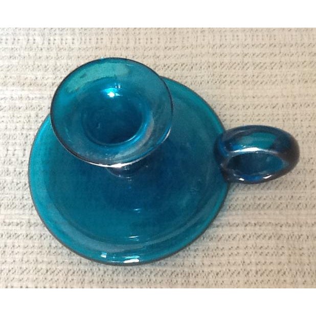 Handblown of beautiful blue glass, this 1970’s charmer mimics a 19th century chamber candlestick holder. This unmarked but...
