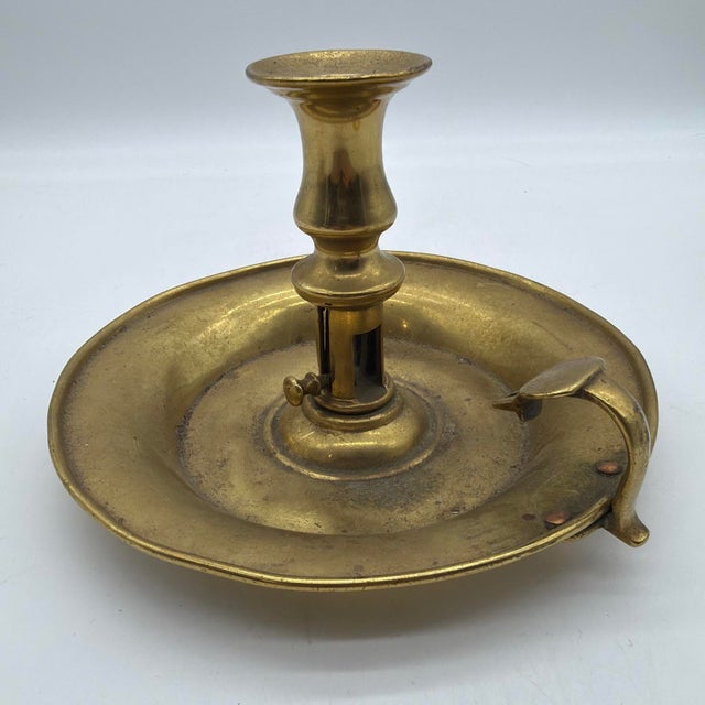 Antique Brass Push-Up Chamberstick, Probably English, Early to Mid 19th Century Description: A substantial antique brass...