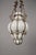 Incredible midcentury Venetian Murano white glass chandelier with an astonishing golden wrought iron frame. This...