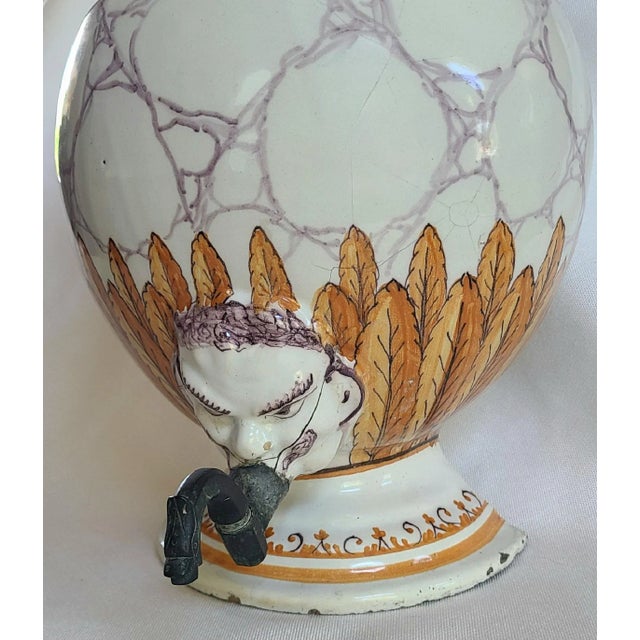 From Caroline Faison Antiques, this 18th century hand painted antique porcelain lavabo with brass spigot is suitable as...