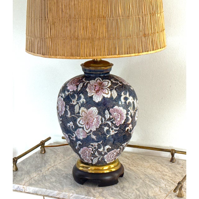 Elegant Frederick Cooper floral table lamp featuring its original harp and finial. This classic Cooper form showcases a...