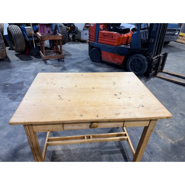 This 19th Century Primitive English Work Table is made of antique pine. With one large working drawer, and very unique...