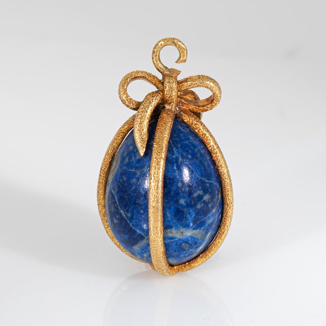 Finely detailed vintage Tiffany & Co Schlumberger lapis lazuli egg charm crafted in 18k yellow gold (circa 1960s to...