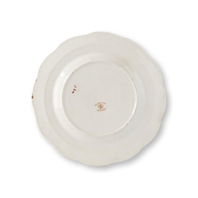 A charming 1897 English commemorative plate celebrating Queen Victoria's Diamond Jubilee, marking the 60th year of her...