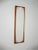 Elegant wall mirror with a rectangular solid teak frame and a shaped internal mirror, secured with metal spacers. A...