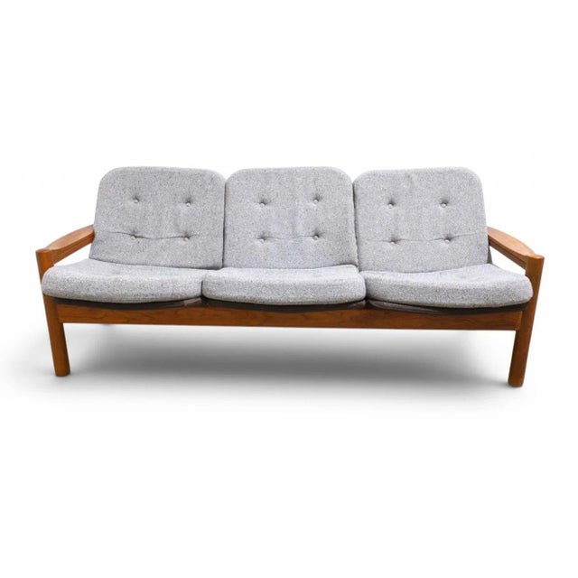A beautifully crafted Danish modern sofa by Domino Møbler, showcasing the clean lines, exceptional craftsmanship, and...