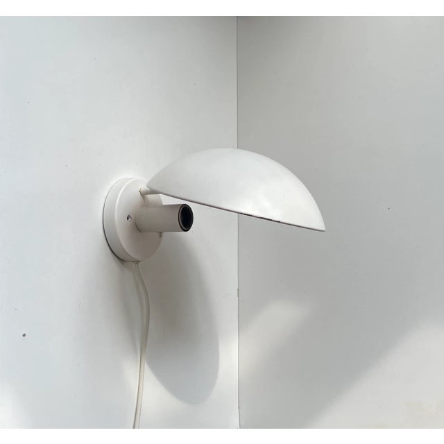 1st series White PH Hat wall lamp designed by Poul Henningsen in the late 1970s and manufactured by Louis Poulsen in...