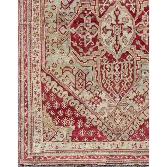 Antique Turkish Ghiordes Rug, rug , country of origin / type: Turkey / Oushak, circa Late-19th Century. Measures: 8'6'' x...