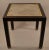 Taylored design square table with parquetry travertine marble top, framed by gold laminate trim, with solid hardwood (...