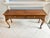Add a touch of timeless sophistication to your home with this beautifully crafted wooden console table. Featuring a rich,...