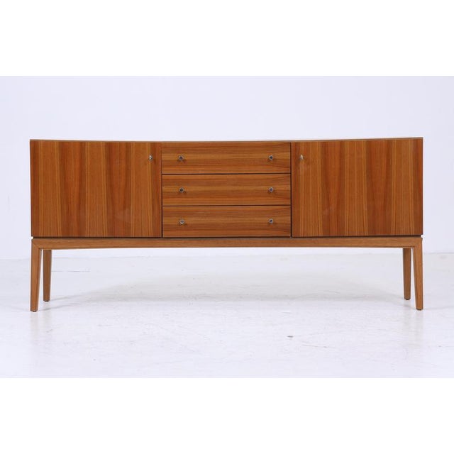 Beautiful sideboard from the 60s with compartments and drawers made of teak * High-quality workmanship * Manufacturer: OTT...