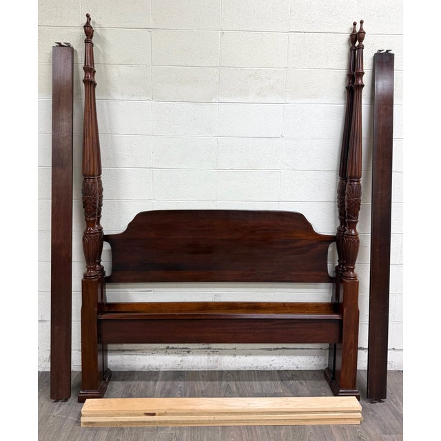 This is an absolutely stunning vintage Queen-size carved four poster rice bed in a rich mahogany finish. Featuring...