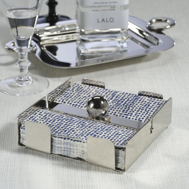 The Basso Napkin Holder combines sleek design with practical functionality. Crafted from steel in a polished finish, it...