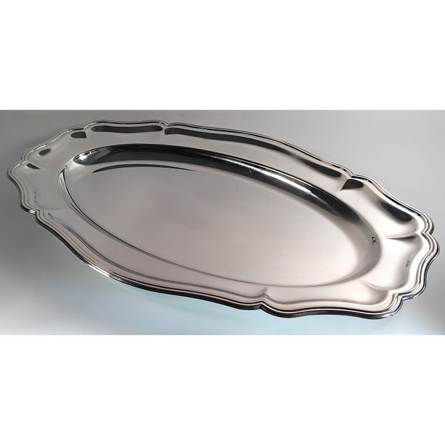 An elegant and substantial vintage serving tray by the prestigious French luxury silversmith Christofle, dating to the...