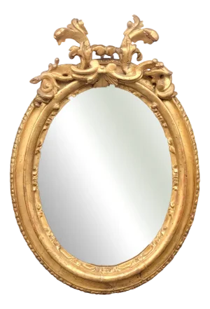 Carved and Gilded Oval Framed Mirror, 1700