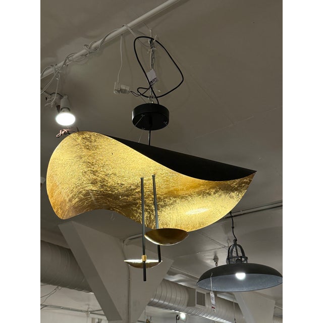 Design Plus Gallery presents the Lederam Manta Pendant by Enzo Catellani for Catellani & Smith. It has a gracefully...