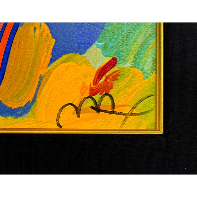 Serigraph in colors on paper. Hand signed lower right by Peter Max. Hand numbered 448/500 lower left. Sheet size: 16 x 14...