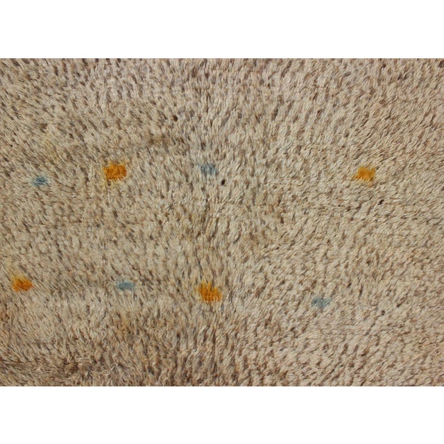 Mid 20th Century Mid 20th Century Vintage Moroccan Rug on a Taupe Field With Pops of Blue and Yellow For Sale - Image 5 of 9