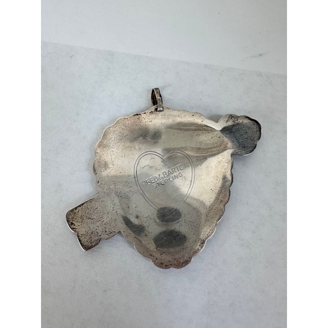 Vintage Reed & Barton Sterling silver ornament in the Key to My Heart pattern. 2.25 x2.5”