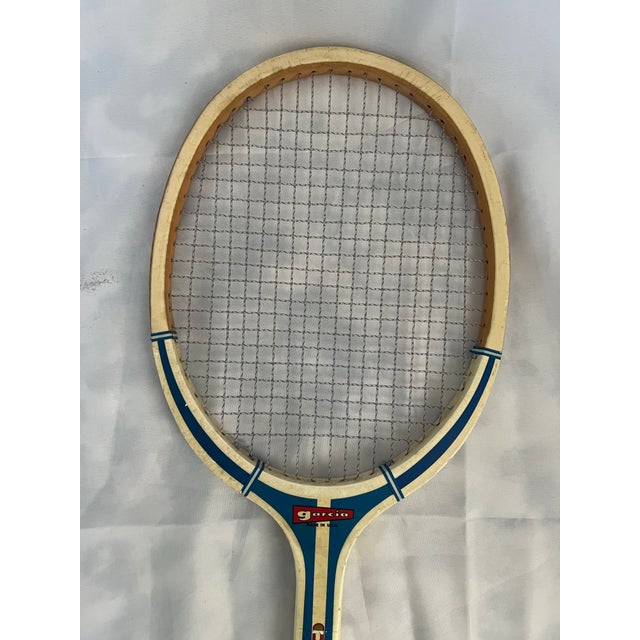 Vintage c1970s Garcia XL-200 white and blue wooden tennis racket. Made in the USA. Measures 9” wide and 29” long....