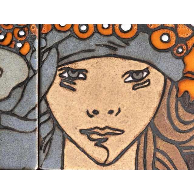 Impressive large wall clock made of glazed ceramic, inspired by the visual universe of alphonse mucha. The female figure...