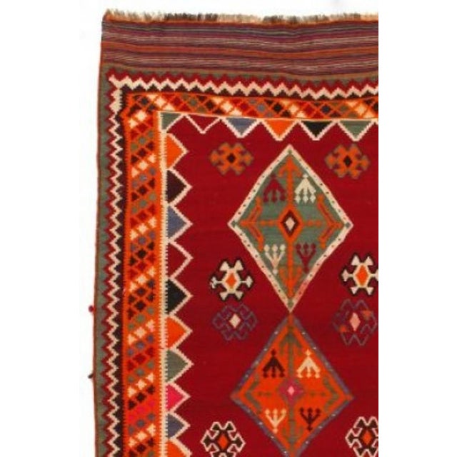Vintage Shiraz Kilim Rug. Hand-knotted. 100% Lamb’s wool. Flat-weave. This collection complements any room looking for a...