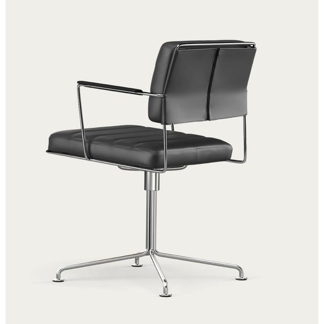 Henrik tengler time chair frame: black, upholstery: black for one collection the time chair, designed by henrik tengler in...