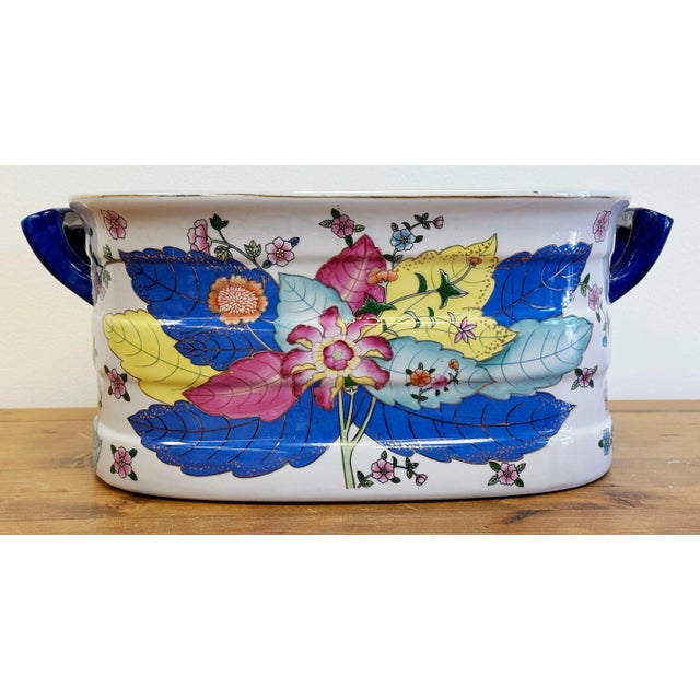 Beautiful Tobacco Leaf motif foot bath or planter. Stunning vibrant floral design with cobalt blue handles and hand-...