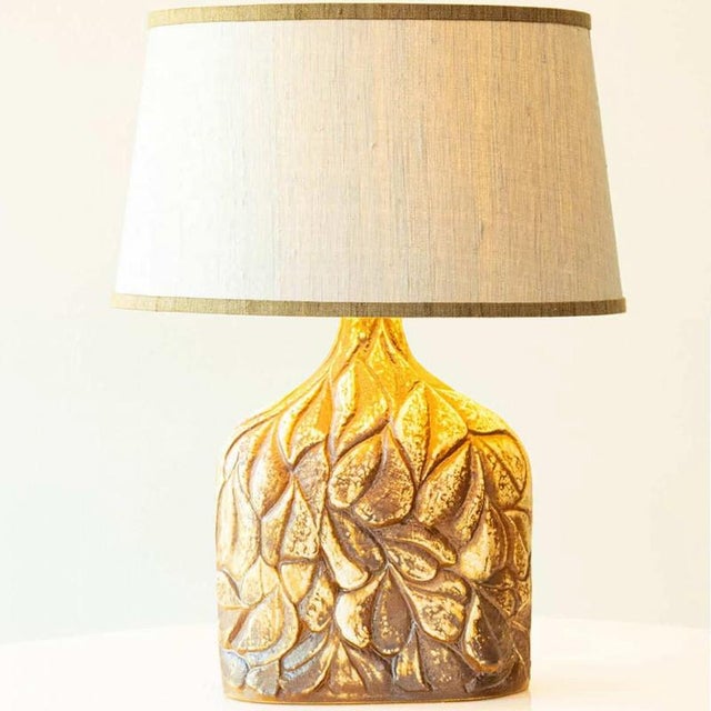 Beautiful ceramic table lamp, 1970s. This lamp base brings refined elegance and rich visual appeal to any interior. with...
