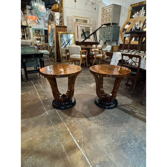 This product is a pair of Italian Art Deco style side tables made of Macassar wood. The sleek and elegant design of these...