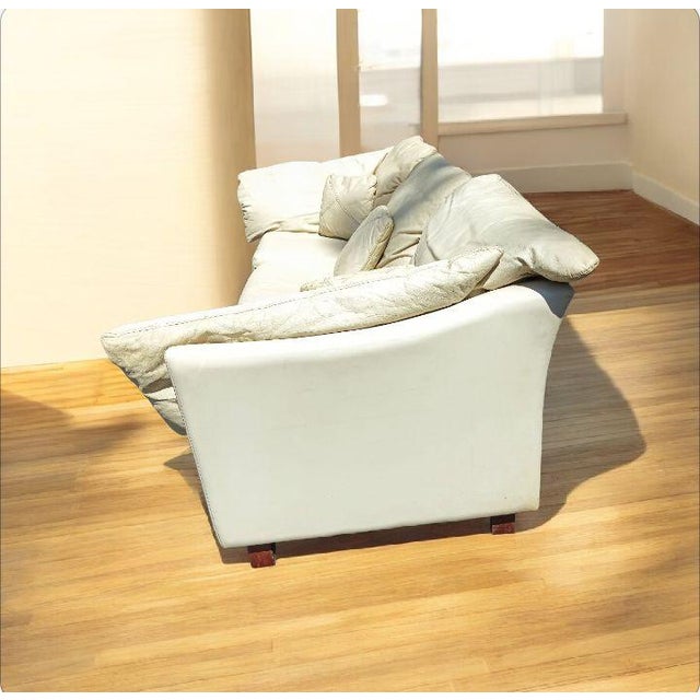 Indulge in the understated luxury of this Dansk leather sofa. Crafted with supple, high-quality leather, this sofa offers...