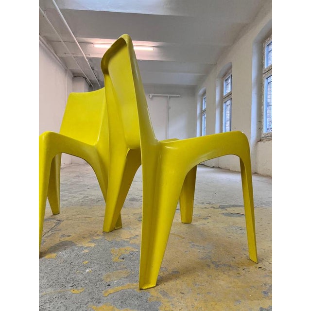 This yellow Bofinger chair is a milestone in design history and is considered the world's first mass-produced plastic...