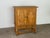 A solid oak two-door cabinet by henning kjærnulf, denmark, 1960s. The door fronts carry kjærnulf's signature geometric...