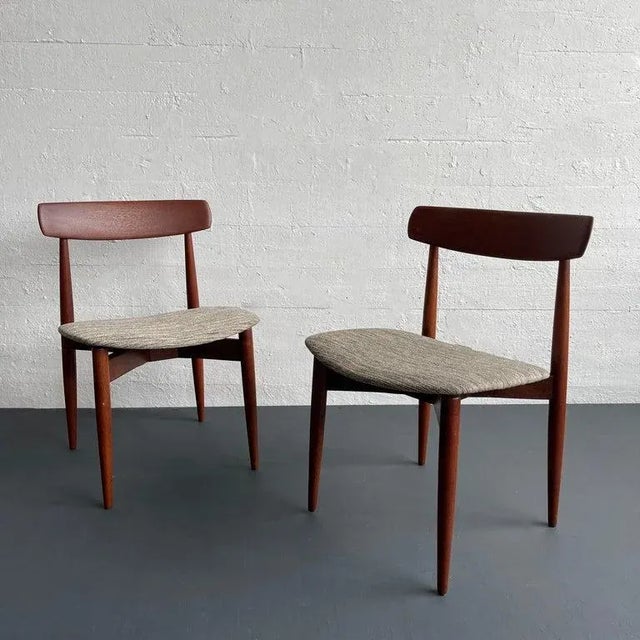 Pair of simply elegant, Scandinavian modern, side dining chairs designed by the Danish designer H. W. Klein for Bramin...