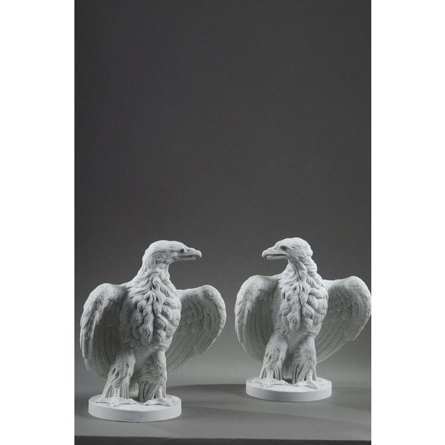 Pair biscuit sculptures of eagles. Work from the second half of the 19th century, bearing the incised mark "Mre. Imple. de...